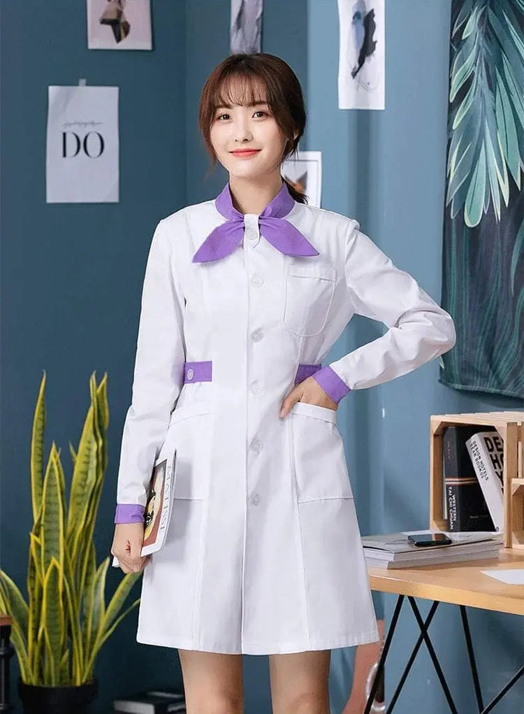 White Showlu Female Nursing Scrubs Dress with bow tie, hospital uniform blouse, and coat for medical professionals.