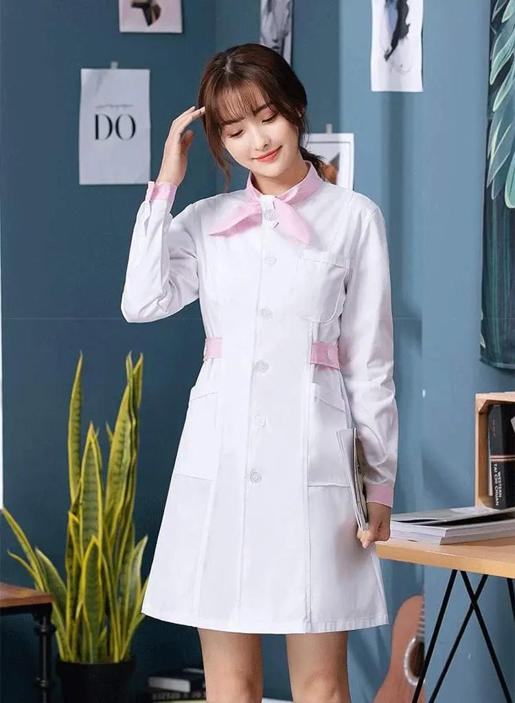 White Showlu female nursing scrubs dress with bow tie, hospital uniform, stylish and professional medical attire for women