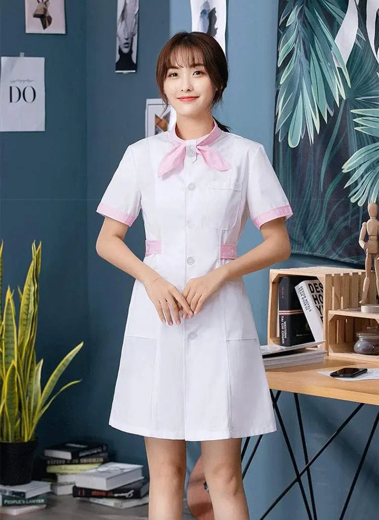White female nursing scrubs dress with a bow tie, hospital uniform by Showlu Fashion Store, featuring a professional and comfortable fit.