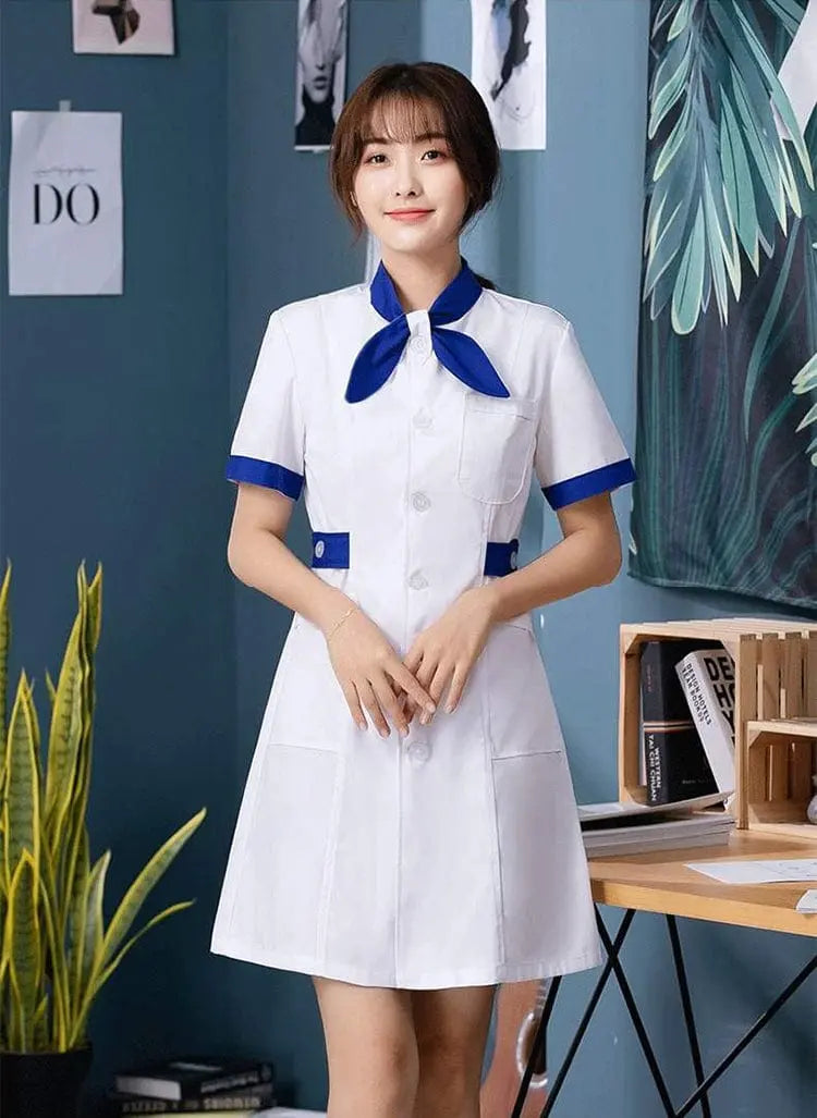 White Showlu Female Nursing Scrubs Dress with bow tie, hospital uniform, blouse, and coat for healthcare professionals