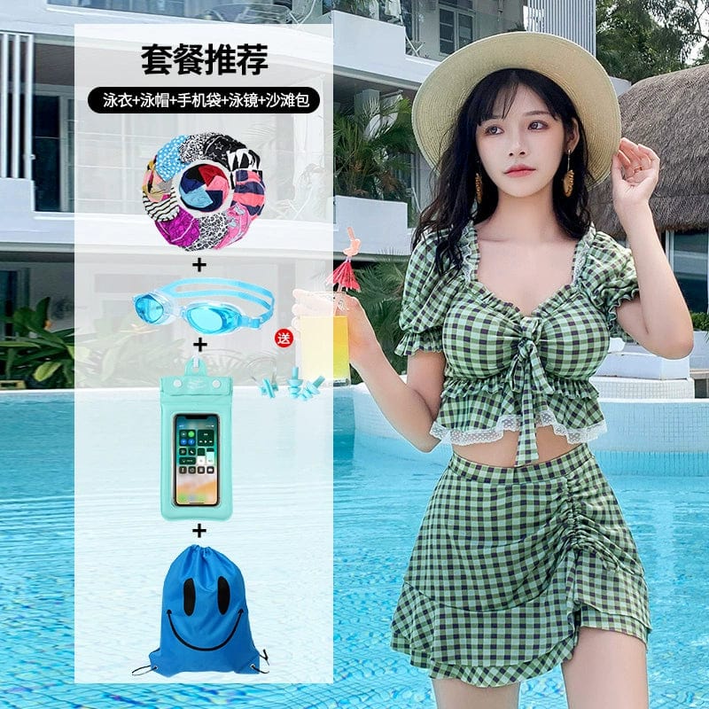 Showlu Fashion Two-Piece Split Swimsuit with conservative skirt style, perfect for hot spring bathing and relaxed water activities.