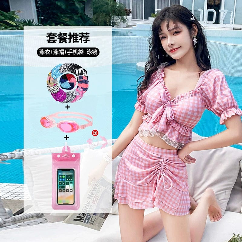 Showlu Fashion Two-Piece Split Swimsuit with a conservative skirt style, suitable for hot springs and relaxing beach days.