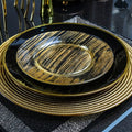 Showlu Luxury Bone China Dinner Plate with black and gold edge, elegant flat dish for steak and dinner presentation.