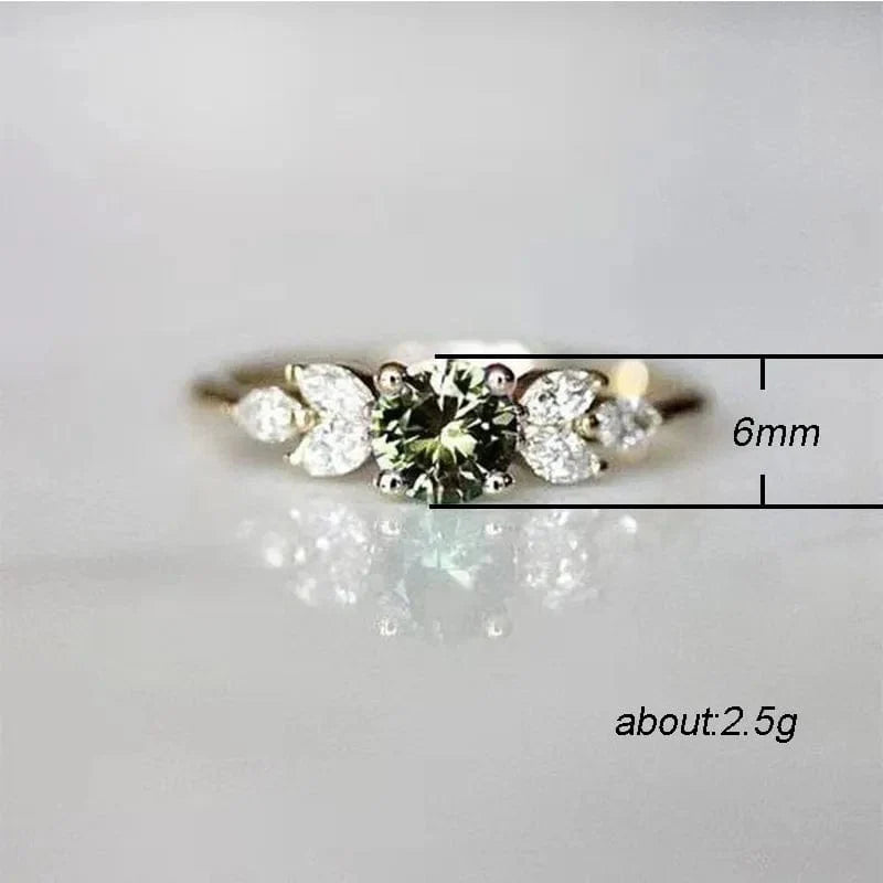 Huitan women's olive green zircon wedding ring with gold leaf-shaped band, elegant jewelry for special occasions