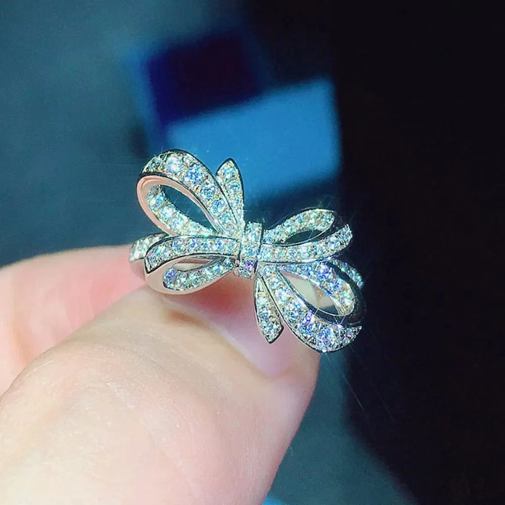 Showlu Romantic Bow Cubic Zirconia Wedding Band Ring for Women, featuring a bow design and sparkling stones, elegant anniversary jewelry