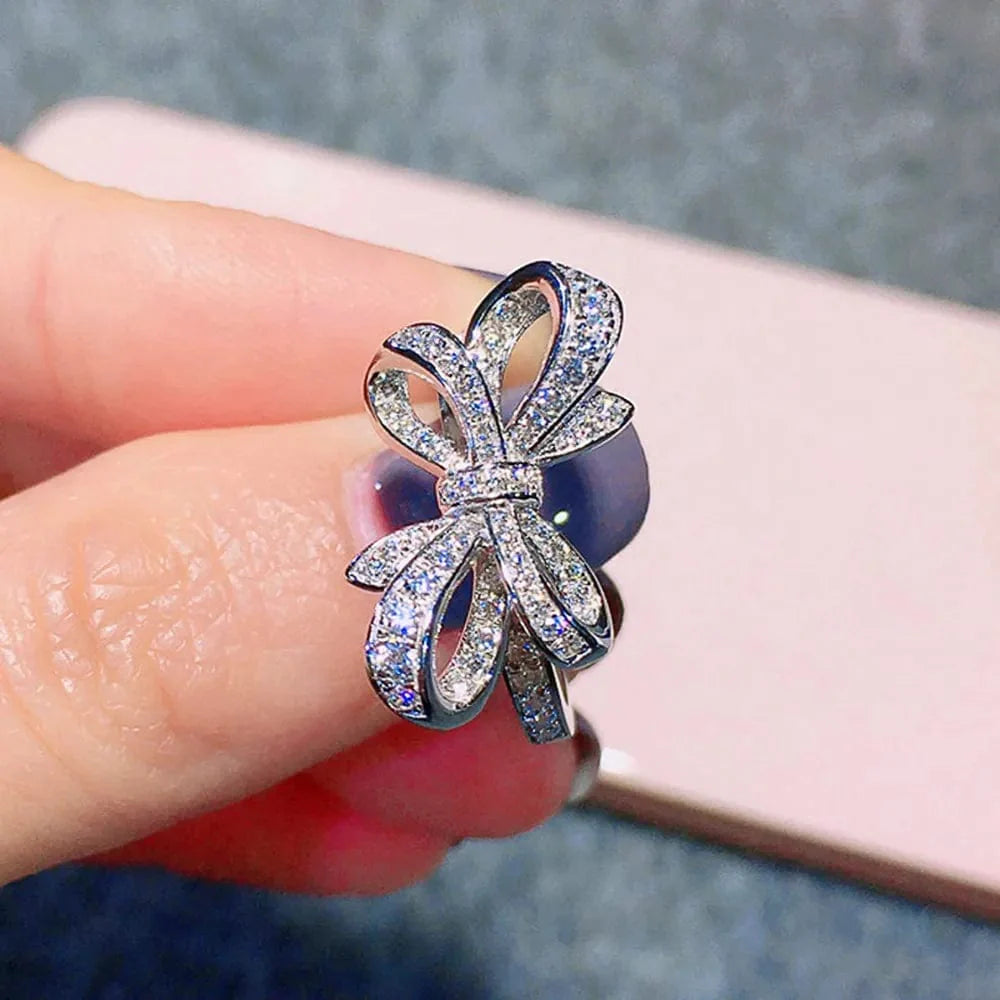 Showlu Romantic Bow cubic zirconia wedding band ring for women, featuring elegant design and sparkling jewelry for special occasions.