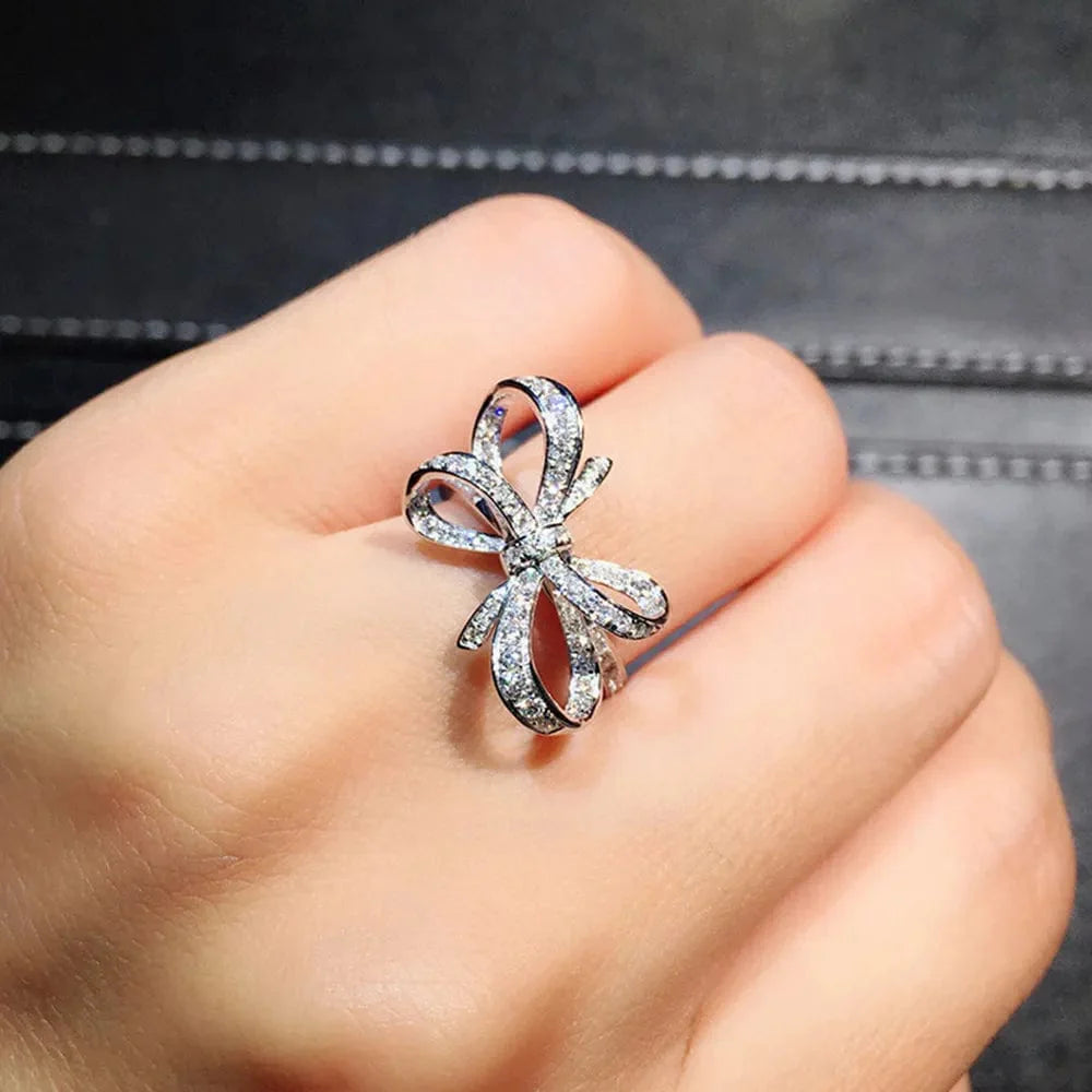 Showlu Romantic Bow cubic zirconia wedding band ring for women, featuring elegant design and sparkling accents for special occasions.