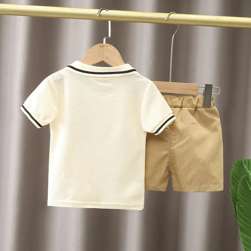 Baby boy summer clothing set by Showlu Fashion with a cotton polo shirt and matching shorts, perfect for casual warm weather.
