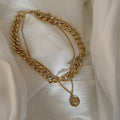 Women’s hip hop thick alloy chain necklace featuring a cross pendant, styled for trendy, internet celebrity-inspired fashion.