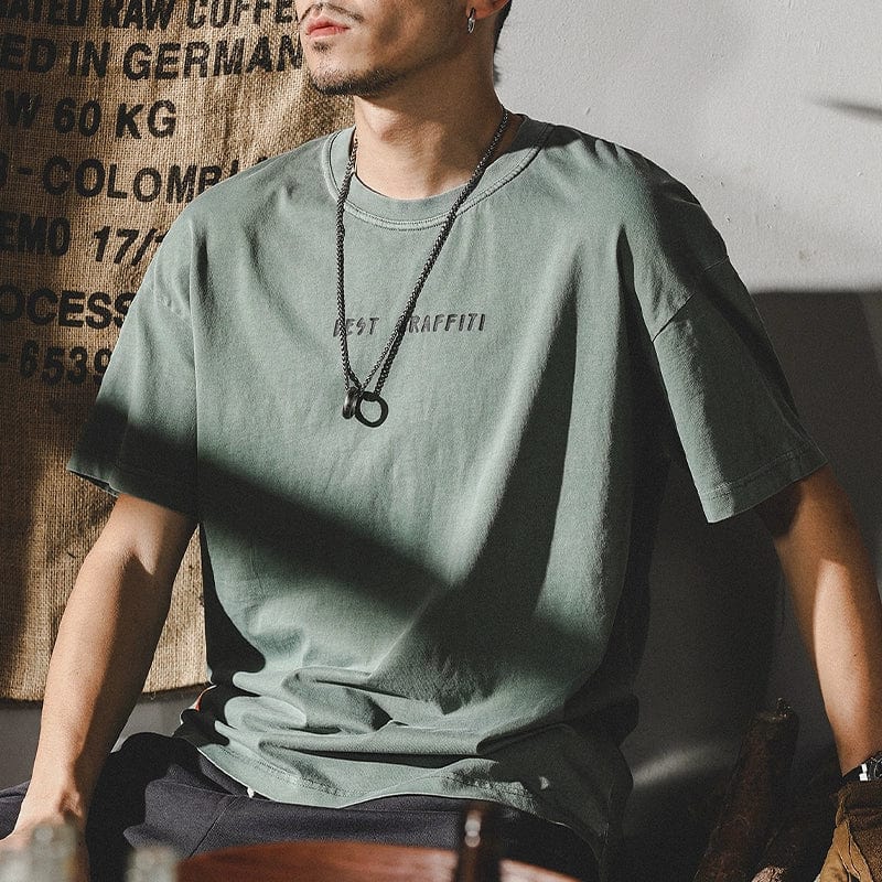 Men's short-sleeved cotton T-shirt in loose American style, shown in white with a round neckline, from Showlu Fashion Store.