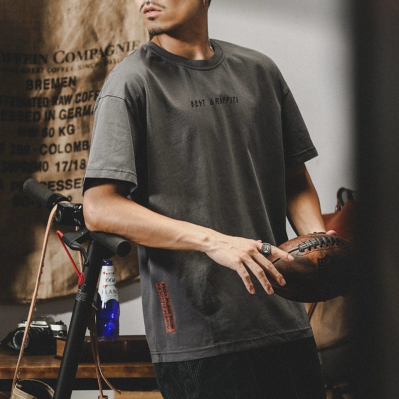 Men's pure cotton short-sleeved T-shirt in loose American style, shown in black with a classic crew neck design.