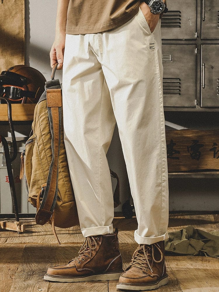 Jereno Ice Silk Cotton Tapered Pants by Showlu Fashion Store, minimalist quick-dry tapered pants in light fabric with a sleek fit.