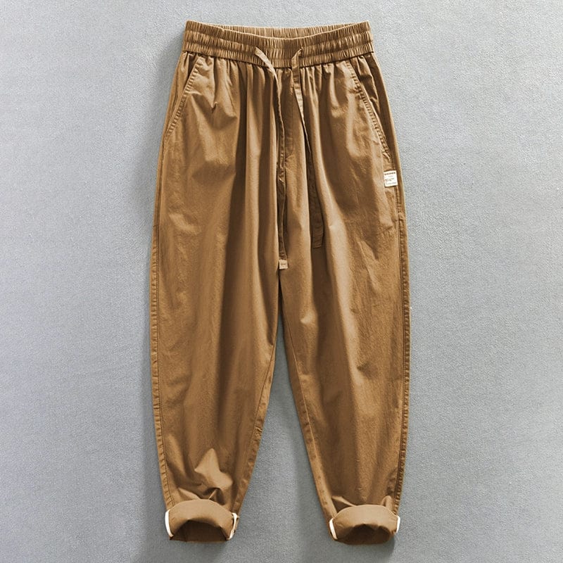 Jereno Ice Silk Cotton Tapered Pants in ninth length, lightweight quick-dry fabric, shown in a minimalist style with a neutral color