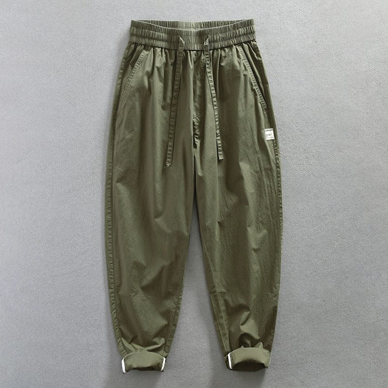 Jereno Ice Silk Cotton Tapered Pants in a minimalist design, quick-dry, lightweight, and stylish for casual wear.