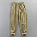 Jereno Ice Silk Cotton Tapered Pants by Showlu Fashion Store, minimalistic thin quick-dry pants in a ninth-length style.