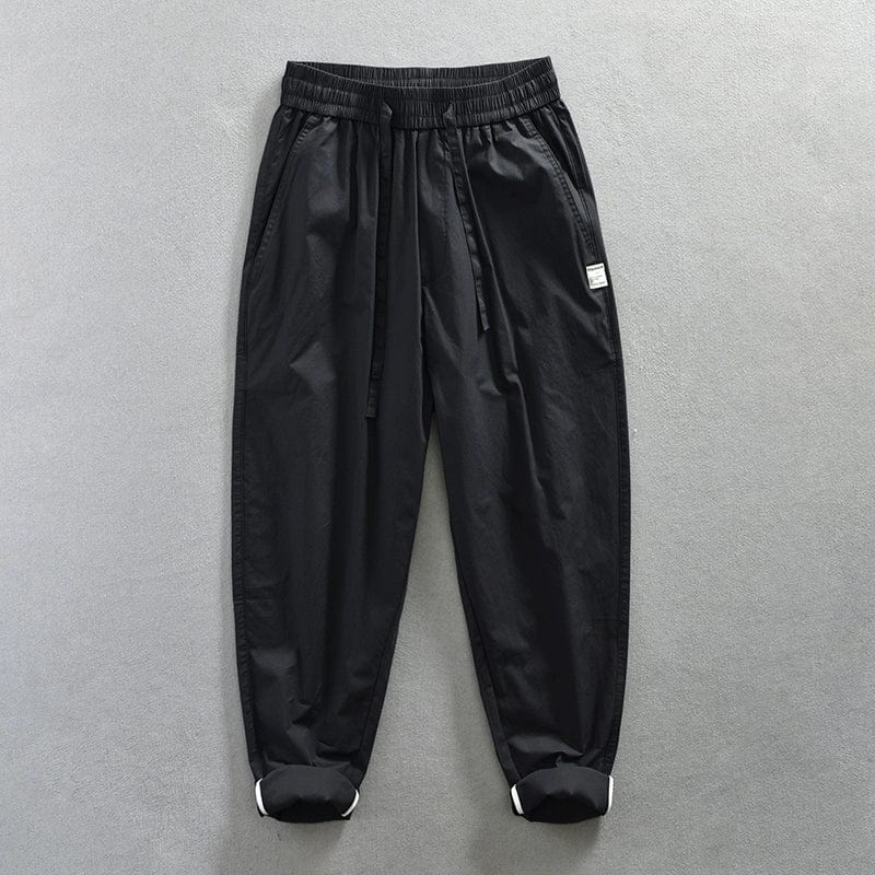 Jereno Ice Silk Cotton Tapered Pants in lightweight, quick-dry fabric with a minimalist design and ninth-length fit.