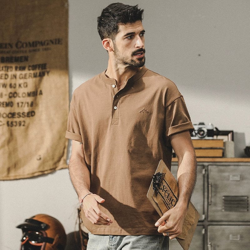 Men's cotton short-sleeved polo shirt with retro Henry collar, shown in a casual, stylish fit by Showlu Fashion Store.