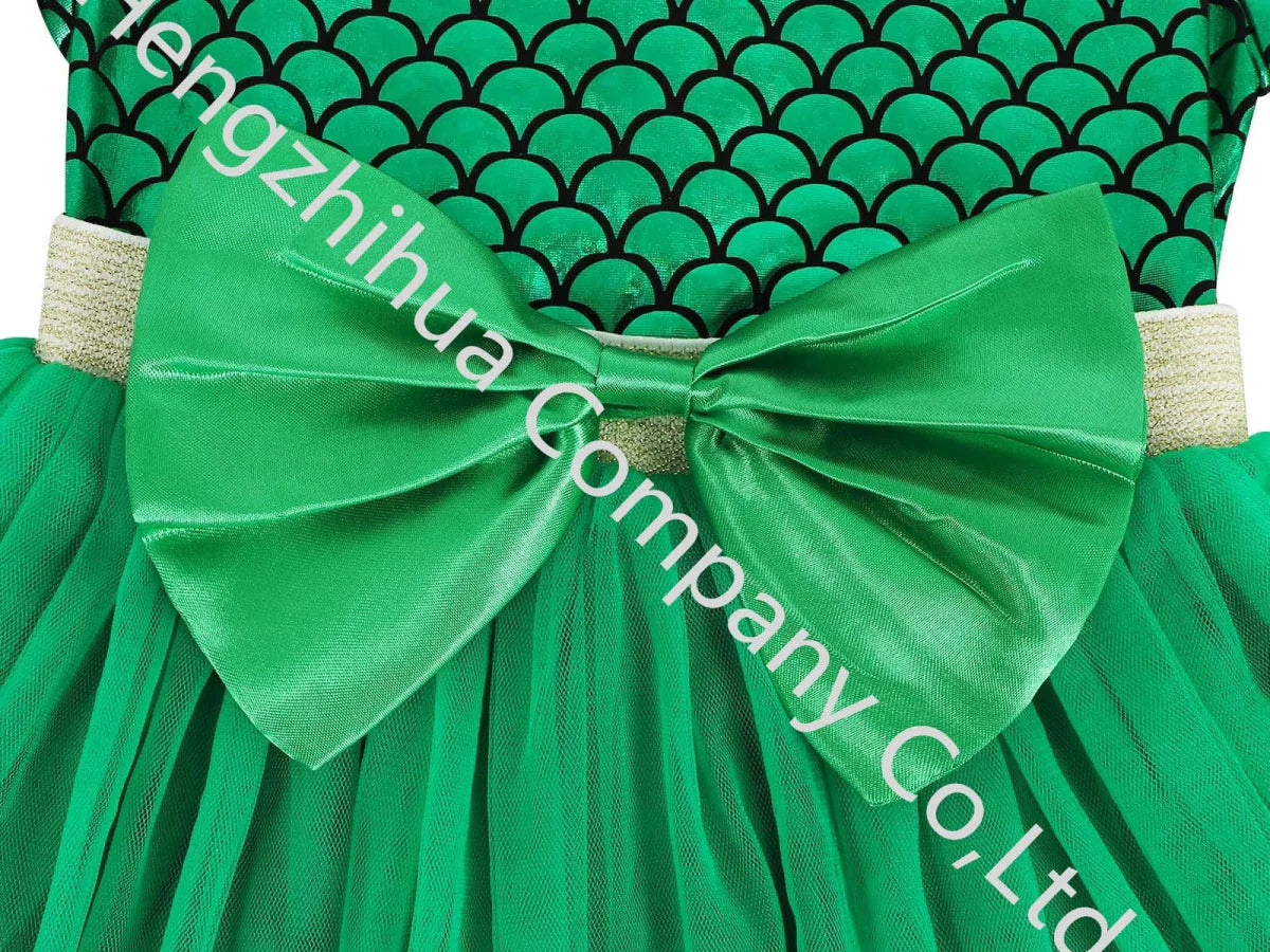Green mermaid princess tulle dress for girls with floral embellishments, bow details, and a fancy party frock design.
