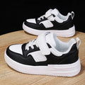 Kids white running shoes by SHOLLU FASHION STORE, waterproof PU leather sneakers for boys and girls, casual and breathable.