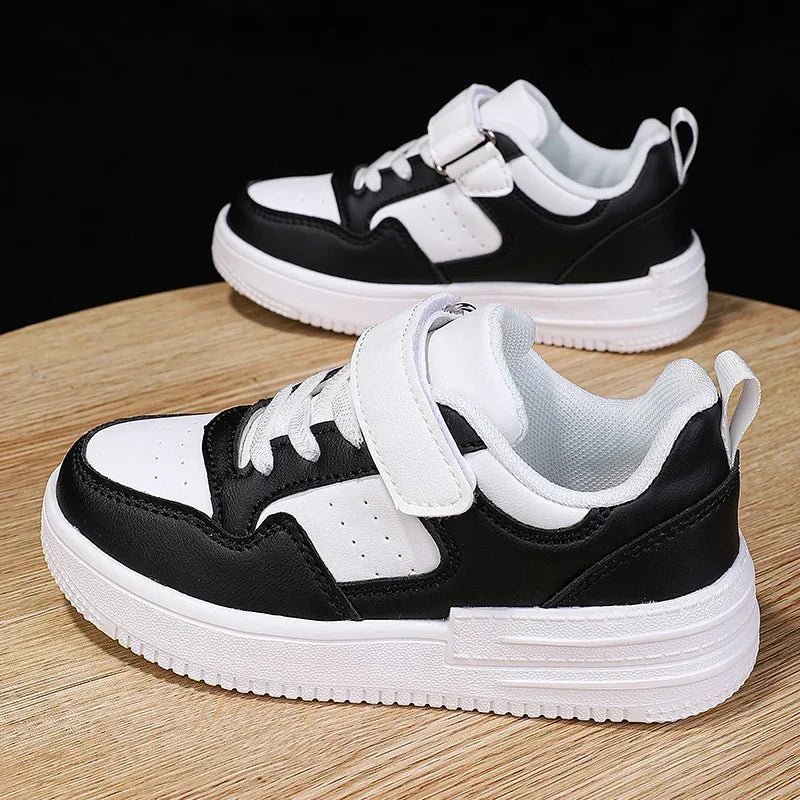 Kids white running shoes by SHOLLU FASHION STORE, waterproof PU leather sneakers for boys and girls, casual and breathable.