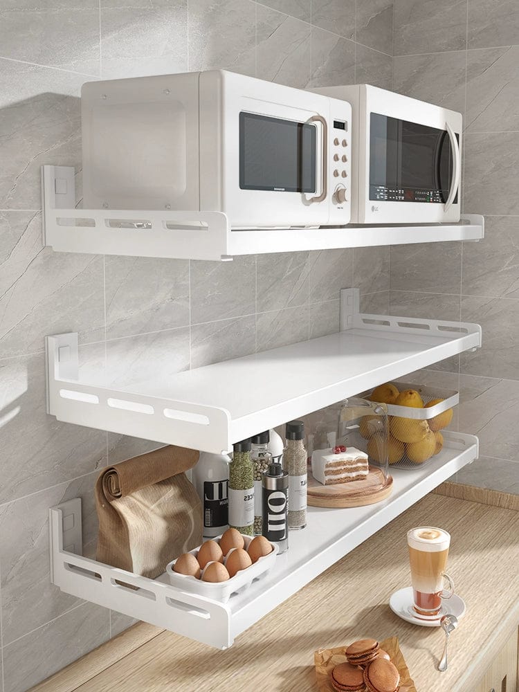 White stainless steel wall-mounted kitchen seasoning rack with punch-free design, ideal for organized, multifunctional household storage.
