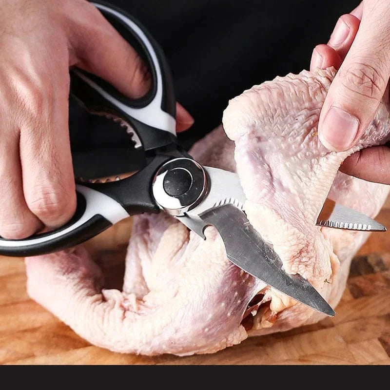 Stainless steel kitchen scissors by Showlu Fashion Store, multifunctional chicken bone shears with non-slip grip for poultry and fish.