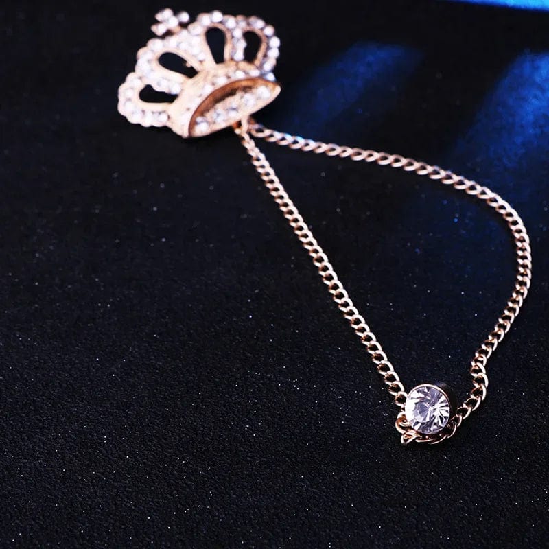 Luxury rhinestone crown brooch pin with tassel for men, zinc alloy jewelry accessory, designed for suits, shirts, and collars.