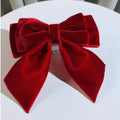 Velvet bow tie brooch by SHOWLU FASHION, featuring a luxurious fabric bowknot for women to style on shirts or collars.