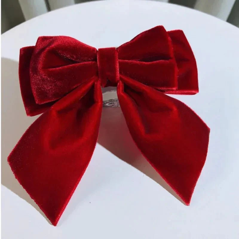 Velvet bow tie brooch by SHOWLU FASHION, featuring a luxurious fabric bowknot for women to style on shirts or collars.
