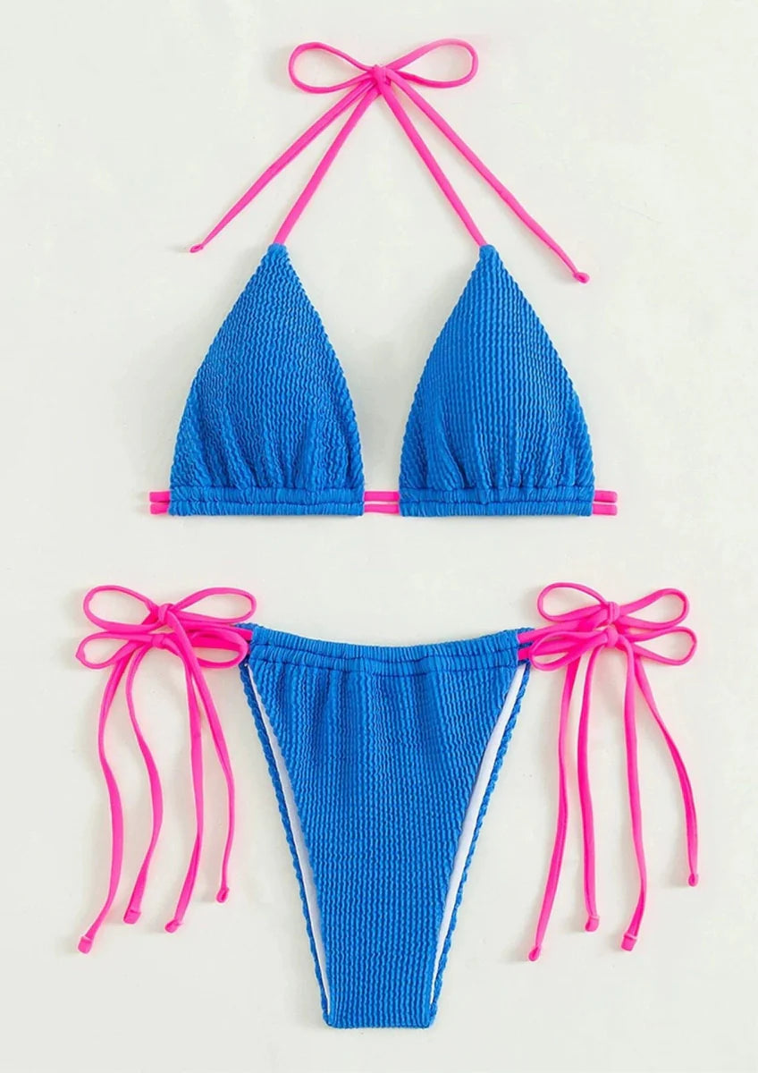 Showlu Fashion lace-up two-piece bikini with sexy three-point design, featuring adjustable straps and vibrant swimwear style.