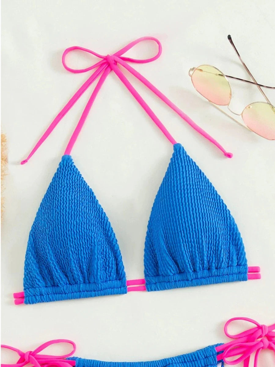 Lace-up two-piece bikini by Showlu Fashion featuring a sexy three-point swimsuit with adjustable ties and stylish design.