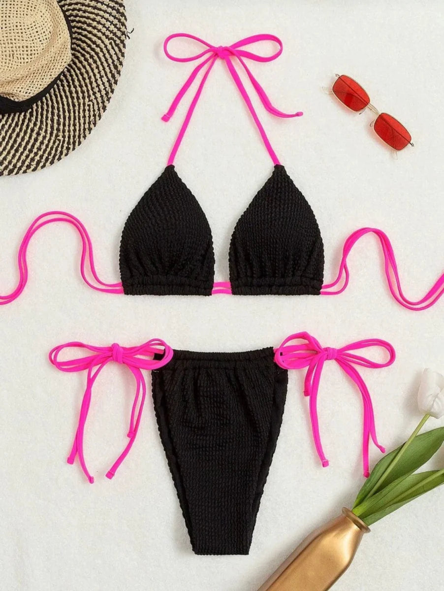 Showlu Fashion lace-up two-piece bikini with sexy three-point design, featuring adjustable straps and vibrant swimwear style.