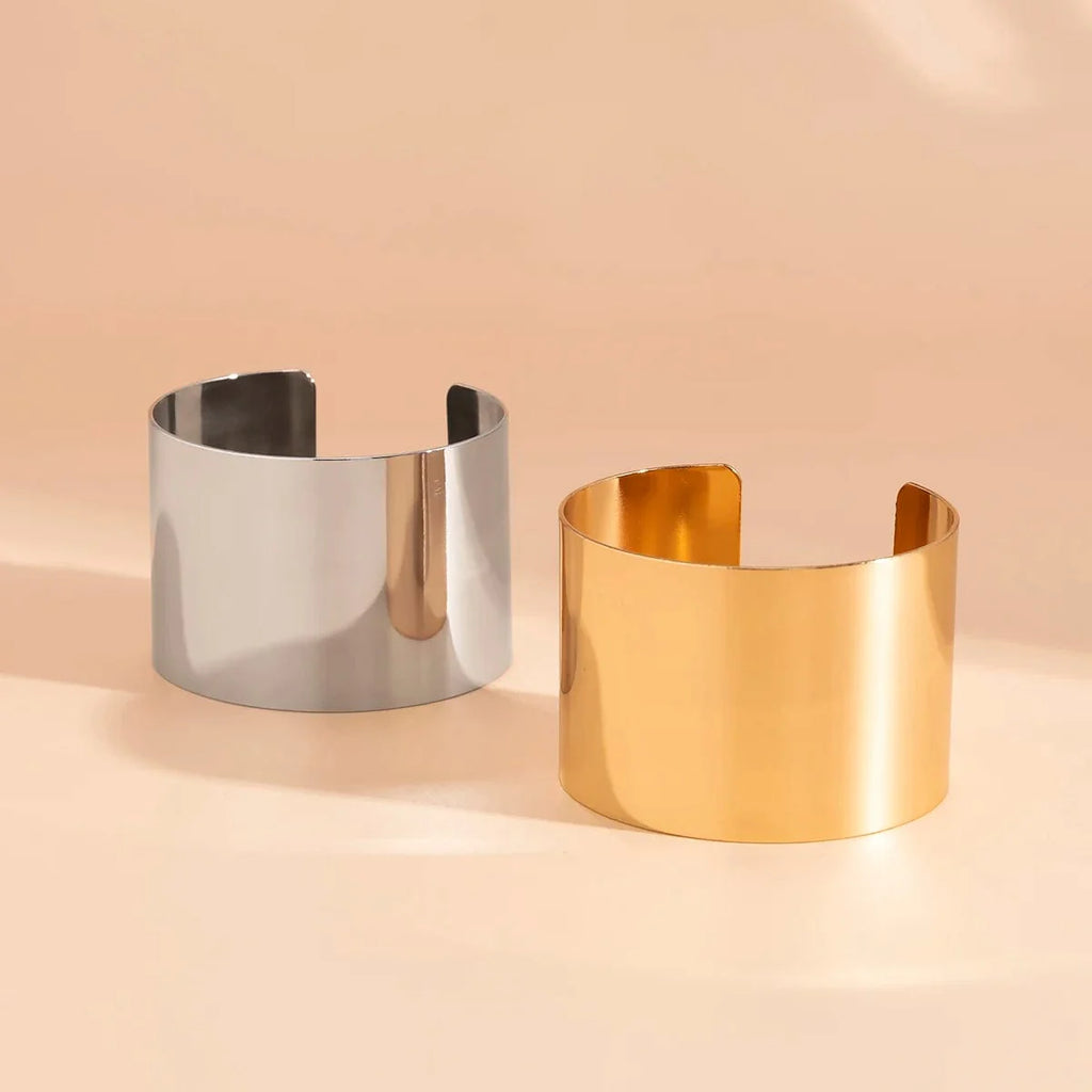 Gold-colored smooth wide cuff bracelet with open design, punk style large bangle for women, stylish jewelry accessory