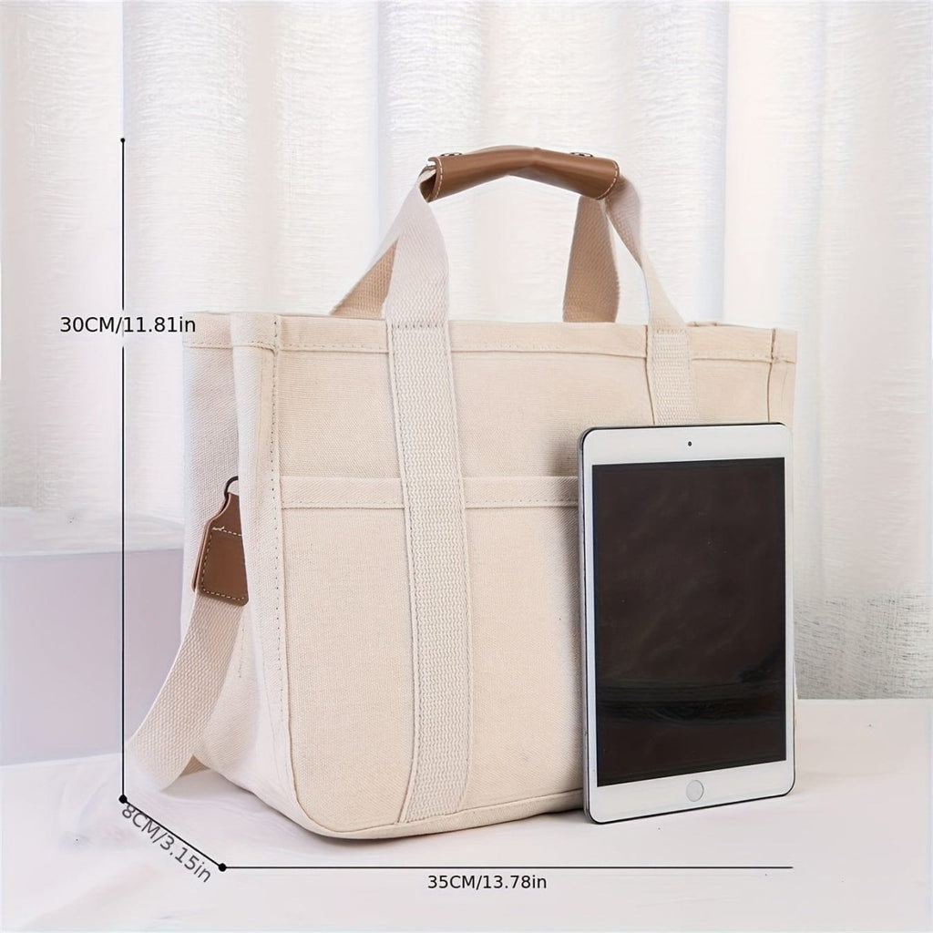 Showlu beige large canvas multi-pocket shoulder bag with multiple compartments and durable handles, includes wristlet for versatile use.