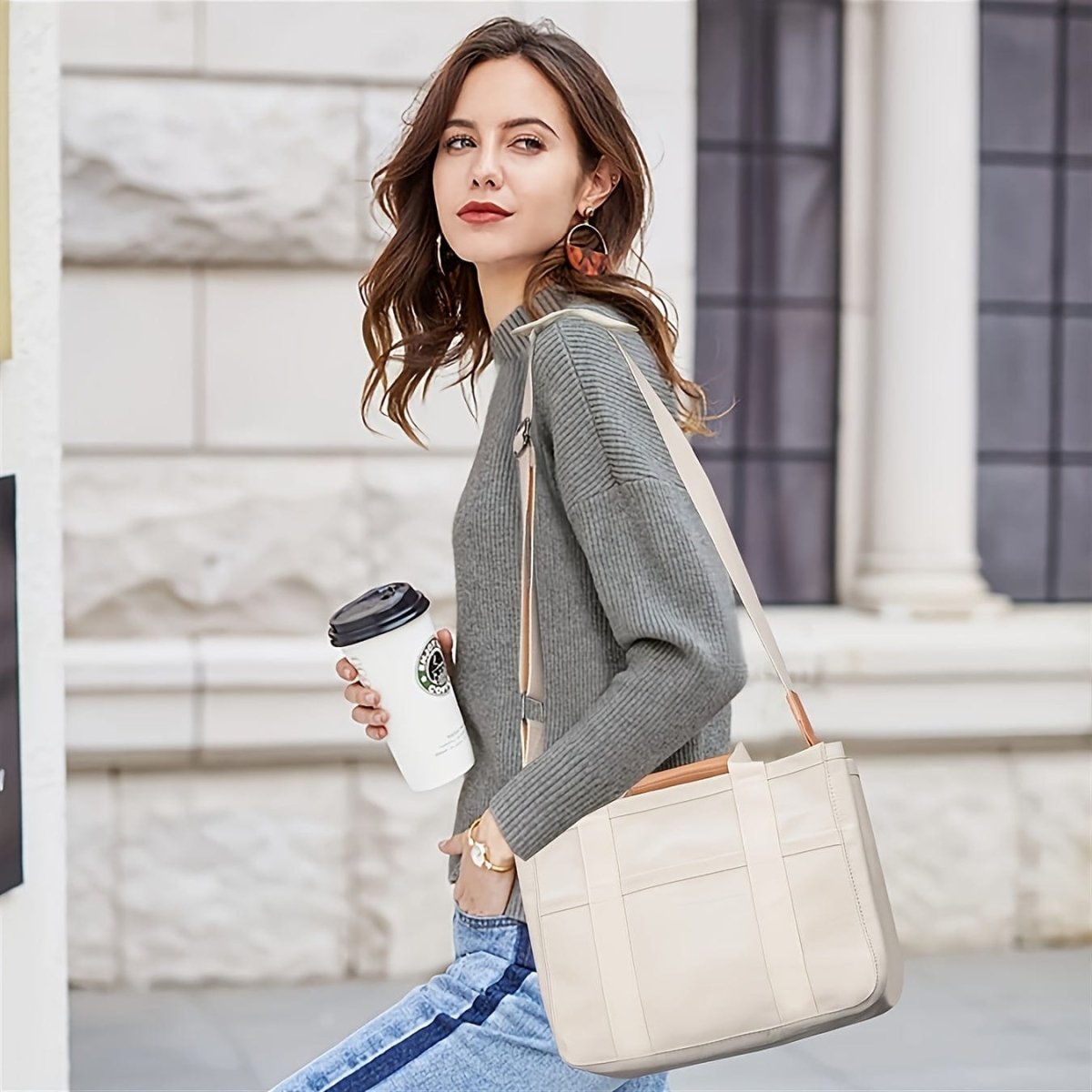 Showlu beige large canvas multi-pocket shoulder bag with compartments and durable handles, includes a wristlet for versatile carrying.