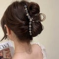Large rhinestone hair clip by Showlu Fashion Store, elegant grip headdress with sparkling stones for women’s hairstyles.