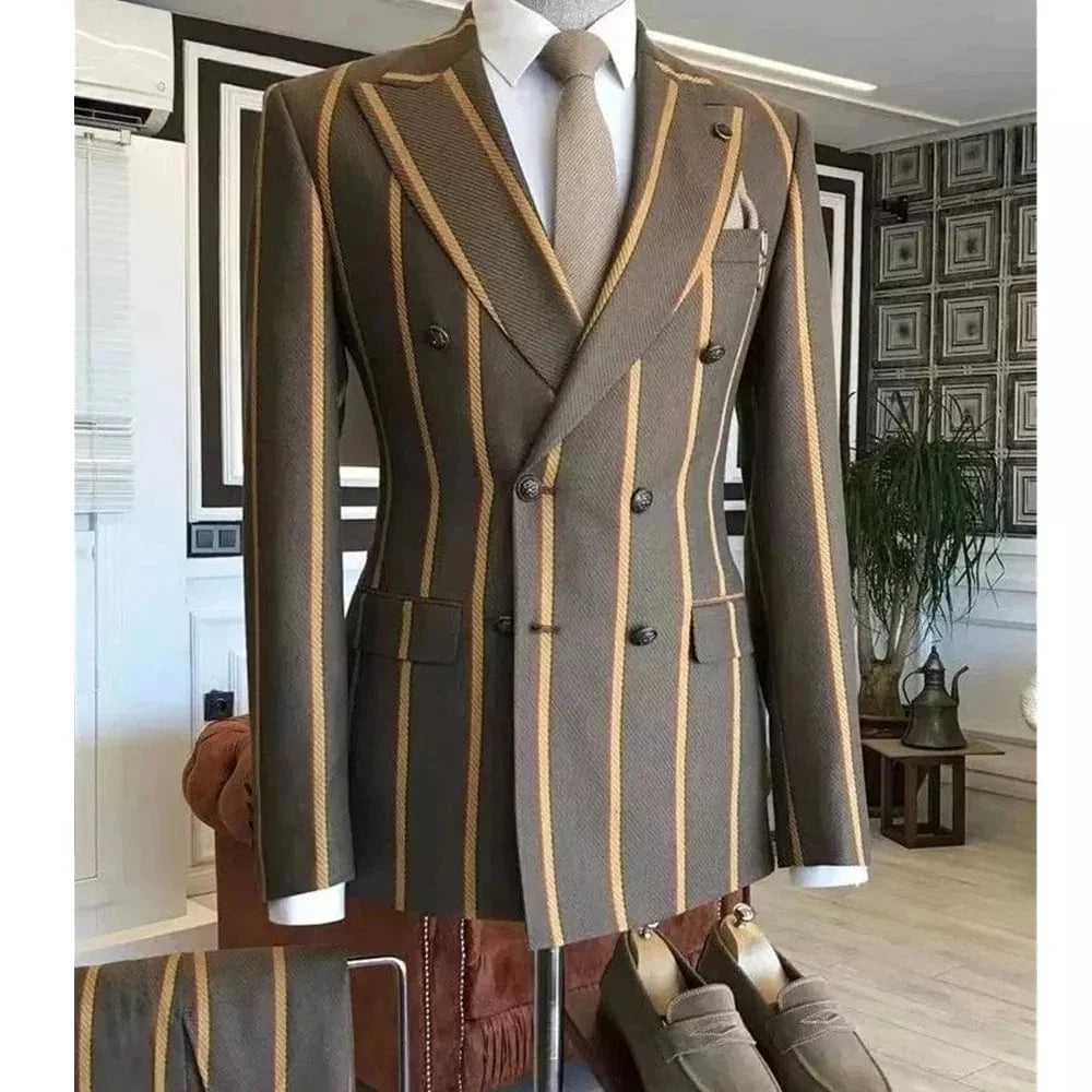 Blue wide stripe men's slim fit suit with double-breasted tuxedo design, peaked lapel, tailored blazer and matching pants.