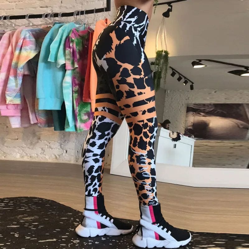 Showlu Women's Leopard Stripe 3D Print Running Leggings with push-up design, slim fit fitness pants for active and casual wear.