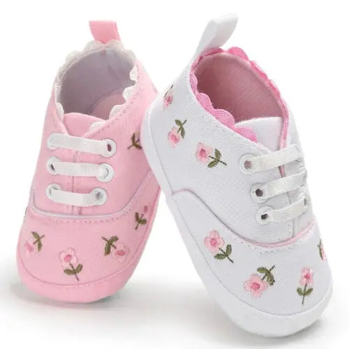 Lioraitiin baby girl flower canvas sneakers with soft soles, cute infant crib shoes for toddlers in a summer design.