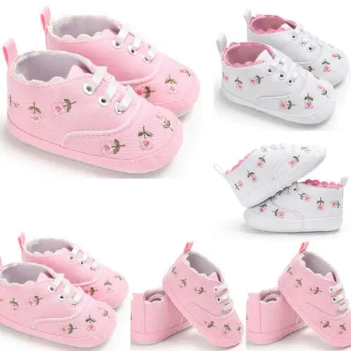 Lioraitiin baby girl flower canvas sneakers with soft soles, infant crib shoes, cute toddler footwear in pastel colors.