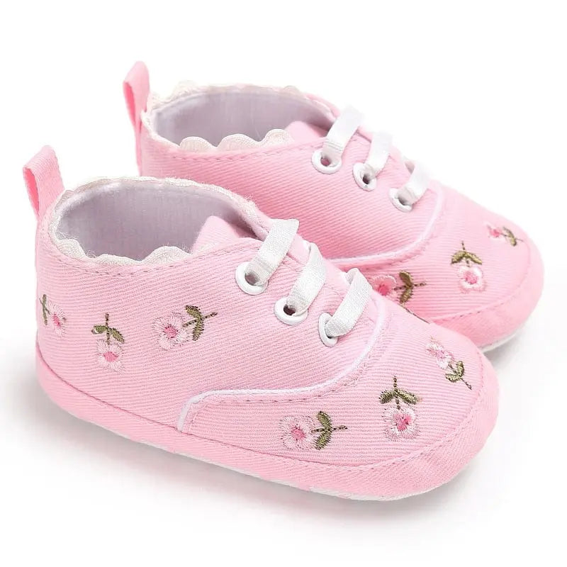 Lioraitiin Baby Girl flower canvas sneakers with soft soles, infant crib shoes featuring cute flower designs for toddlers.