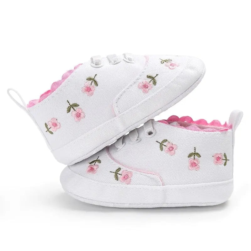 Lioraitiin baby girl flower canvas sneakers with soft soles, cute infant crib shoes for toddlers, shown in a summer style.