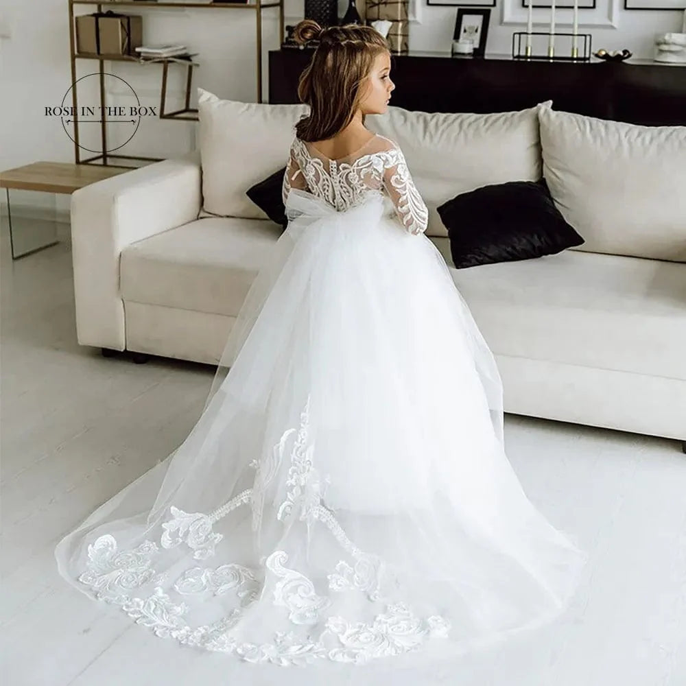 White Rose in the Box long sleeve lace flower girl dress, ball gown style with intricate lace details for special occasions.