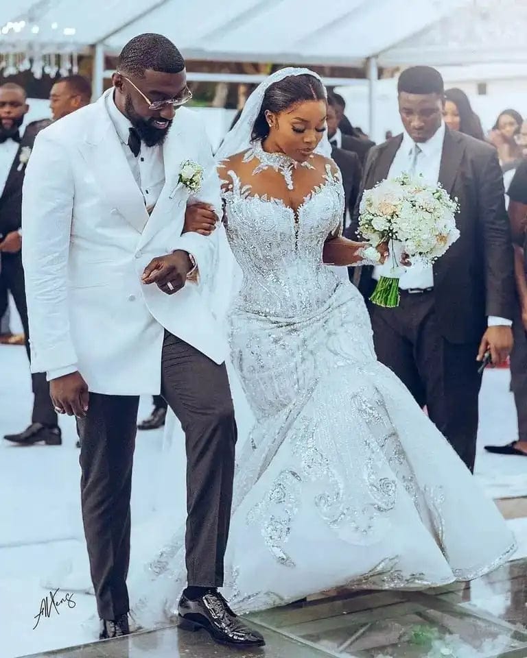 Showlu Fashion Mermaid V-Neck wedding dress with satin lace fabric, train, and elegant shoulder design in a stylish bridal gown.