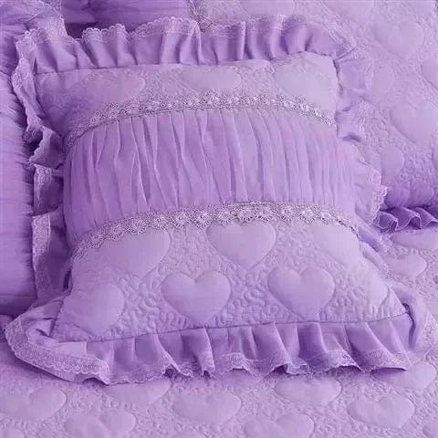 Cotton duvet cover set with lace edge and geometric pattern, includes pillowcases, in a luxurious 3-piece bedding set.