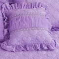 Cotton duvet cover set with lace edge and geometric pattern, includes pillowcases, in a luxurious 3-piece bedding set.