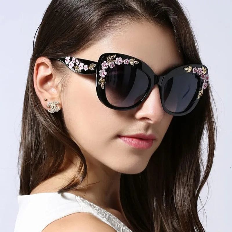 Buyuteen women's oversized cat eye sunglasses with pink frames, vintage style, UV400 protection, trendy large flower design.