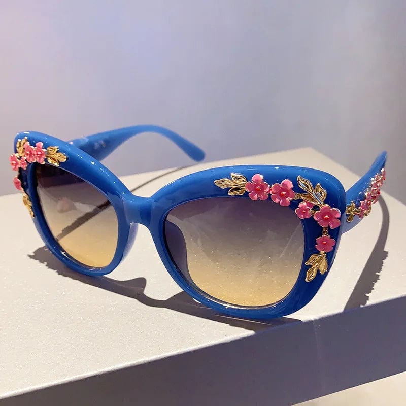Buyuteen women's oversized cat eye sunglasses with pink vintage frames, UV400 protection, trendy flower design, and big fashionable style