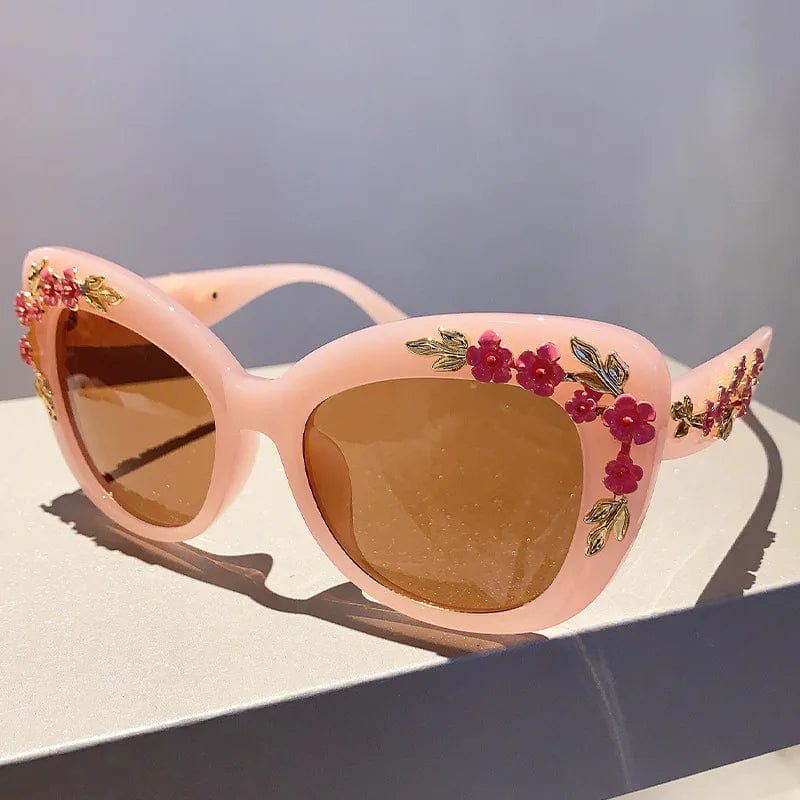 Buyuteen women's oversized cat eye sunglasses with pink frames, vintage style, UV400 protection, and trendy big flower design.