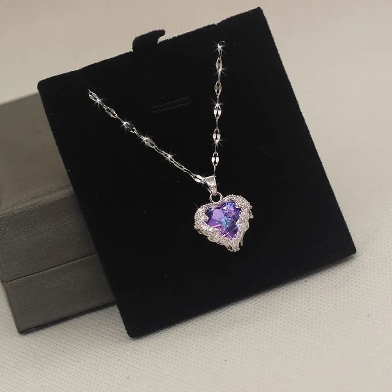 Colorful crystal ocean heart pendant necklace by Showlu Fashion, featuring a stainless steel chain and vibrant, elegant design.